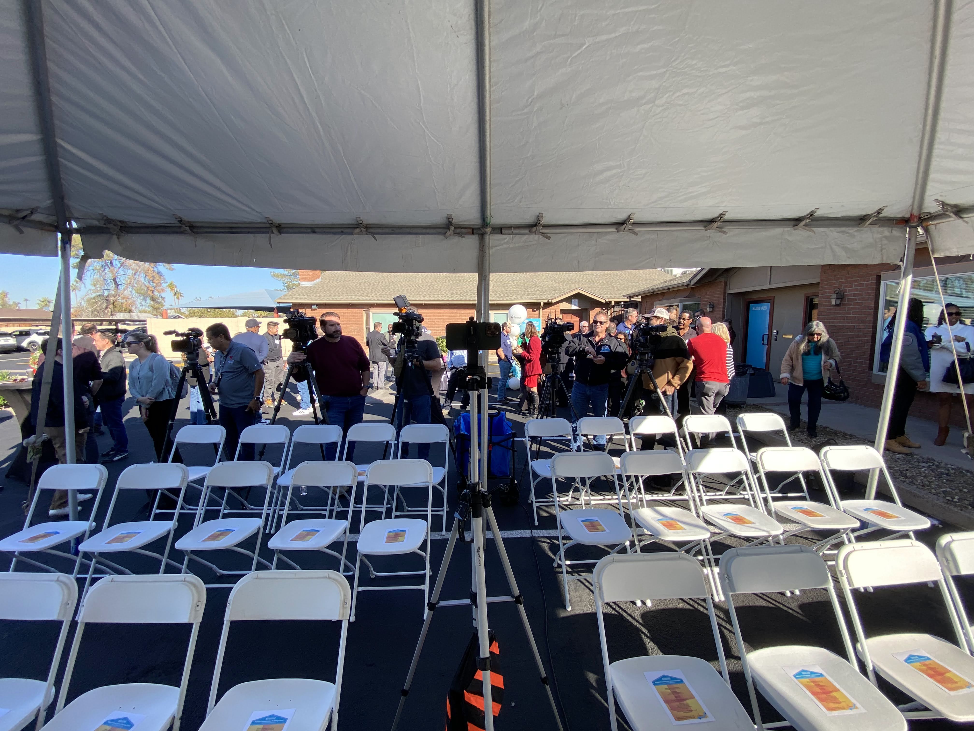 Rows of chairs set up for an event